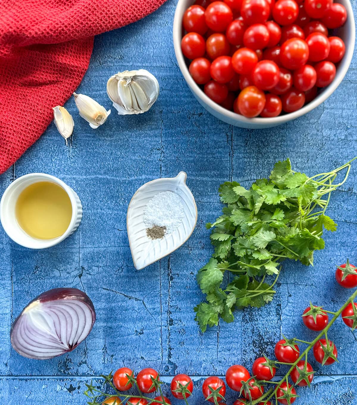 Ingredients needed to make a fresh chunky cherry tomato salsa - see the recipe card