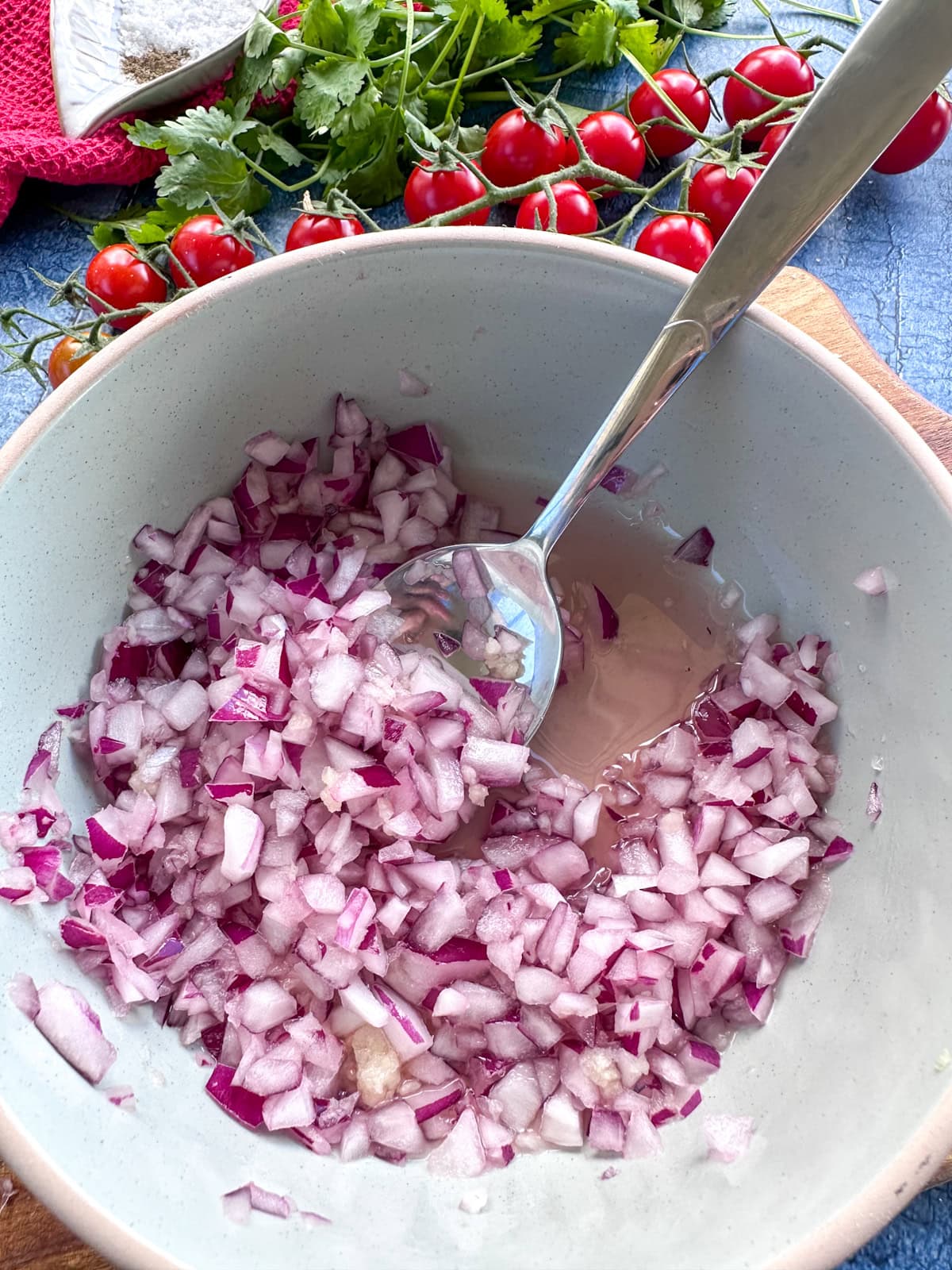 Resting the onion in lime juice to release some of the bitter flavour