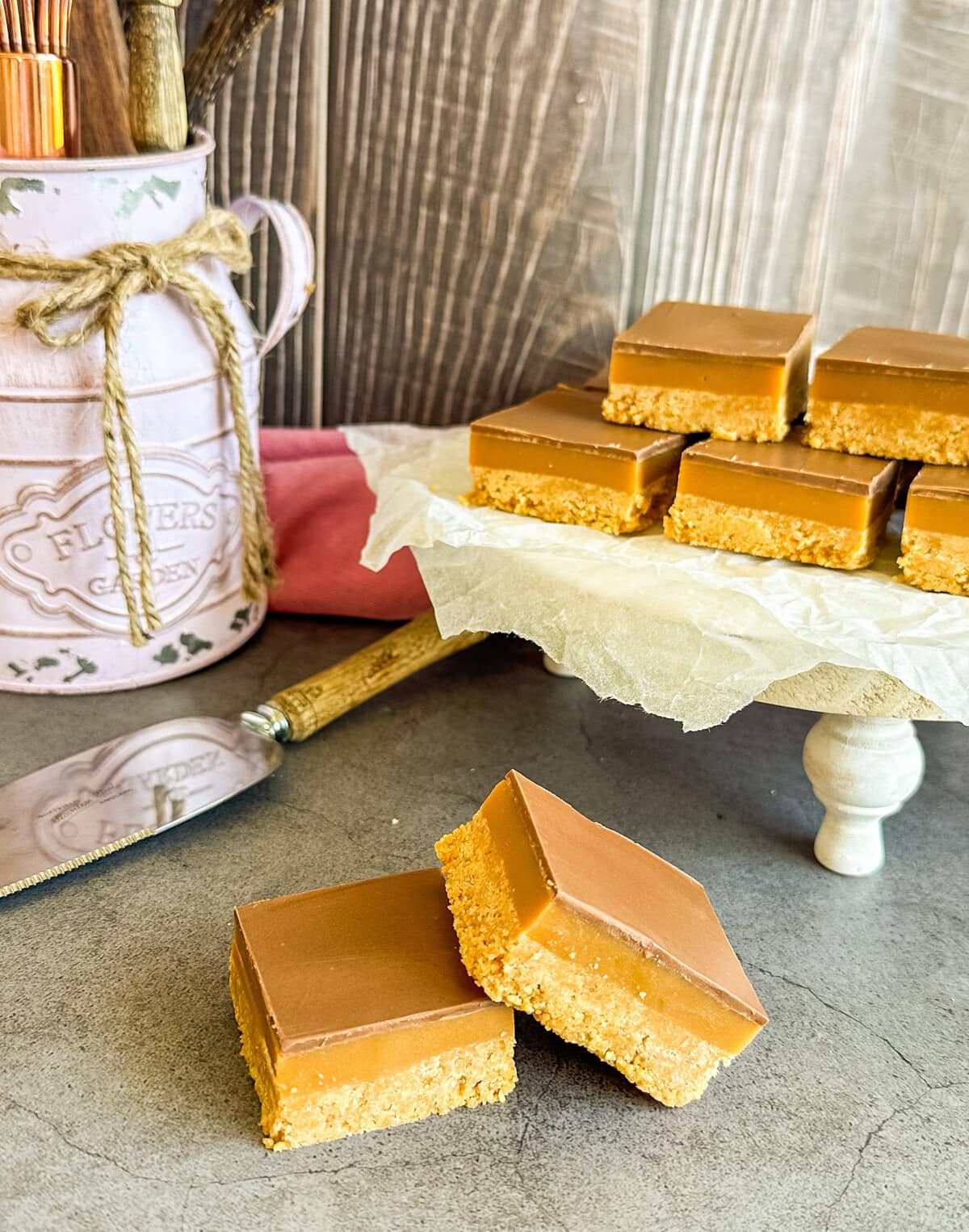 pieces of no bake caramel slice on a table