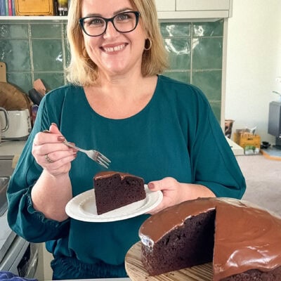 Anna in the kitchen with her best ever chocolate cake