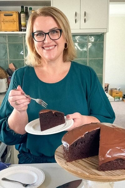 Anna in the kitchen with her best ever chocolate cake