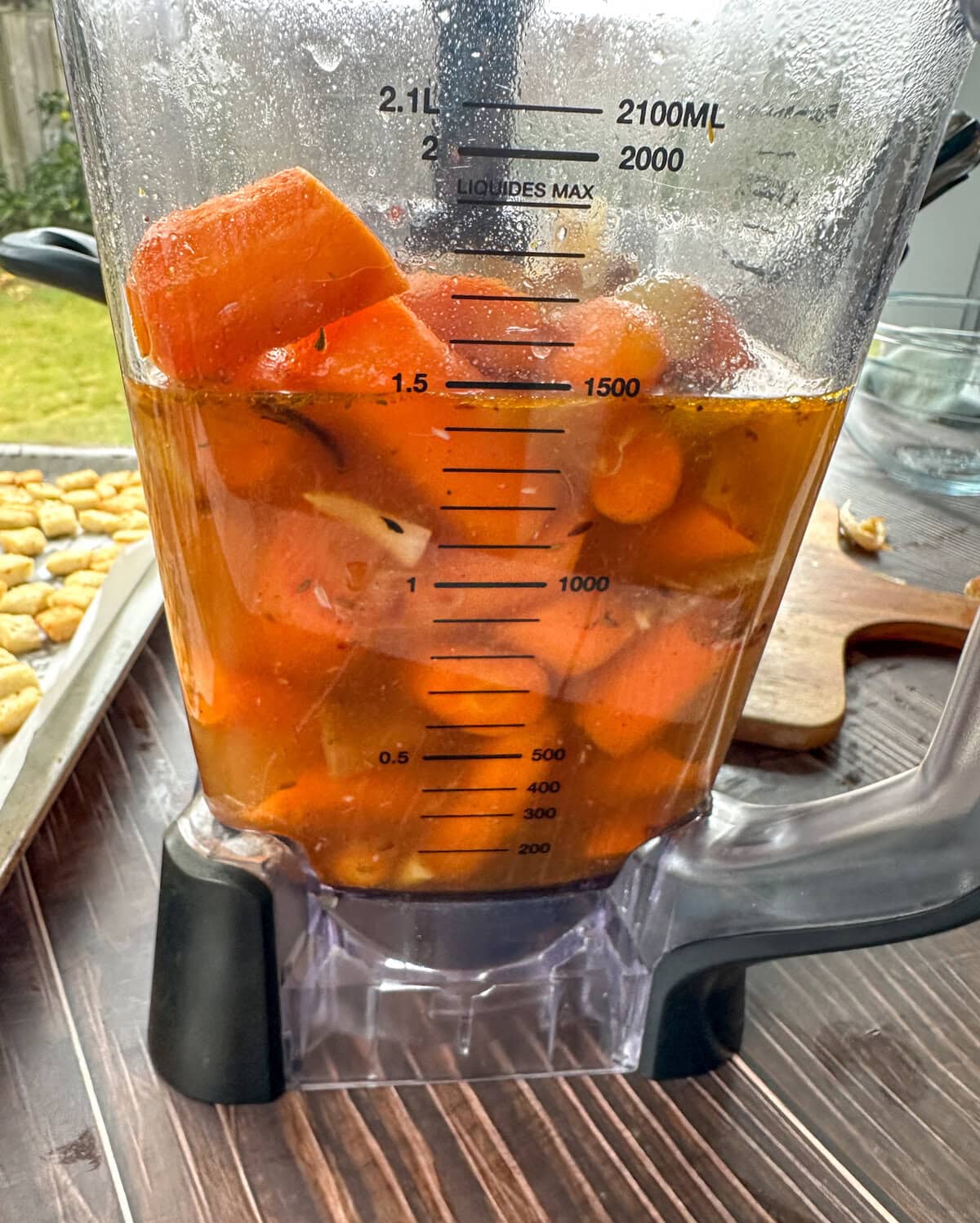 Heat proof bender with the roasted carrot soup before blending