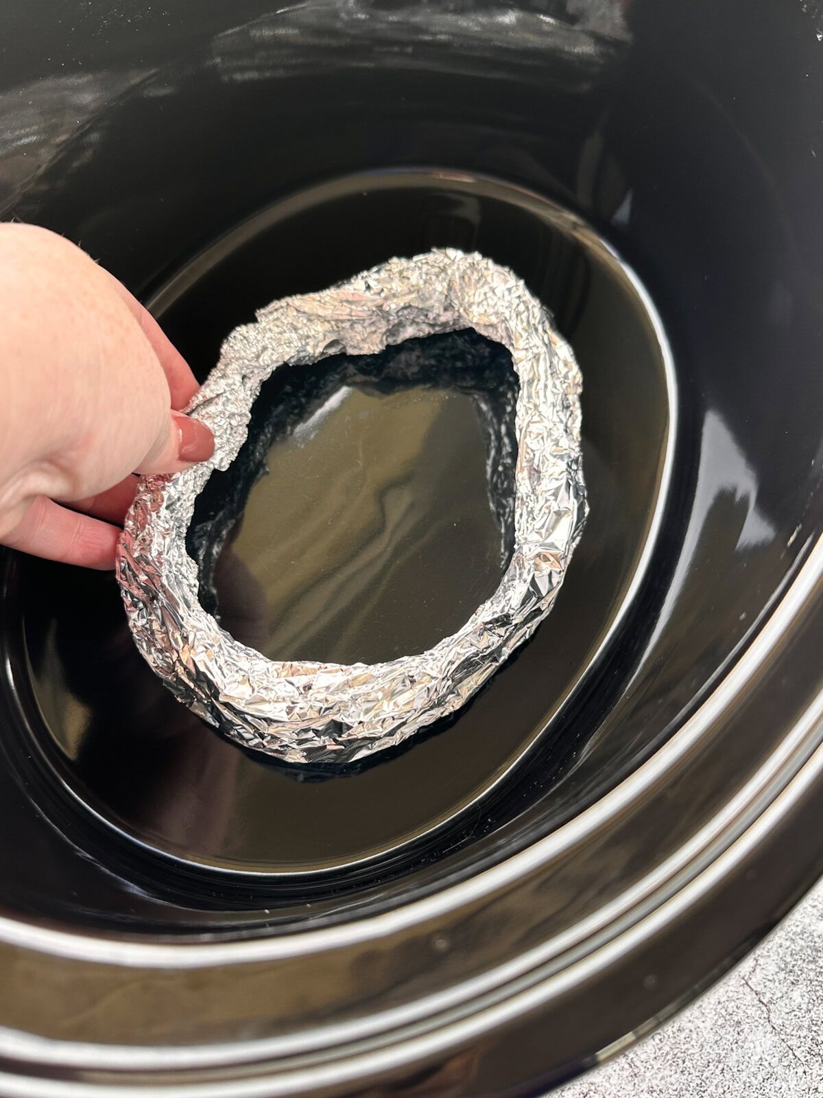 How to make a foil ring to place in the bottom of the slow cooker